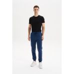 Ar-Ma Erkek Eşofman Alti Baskisiz Basic Yandan Fermuarsiz ve Arkalar Fermuar Cepli Lastikli Dar Paça Örme Kumaş Regular Fit %70 Pamuk %30 Polyester 30/1 Şardonlu Üç Iplik K30174681502 - Mavi-M24 - XL