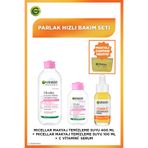Garnier Parlak Bakım Seti - C Vitamini Serum & 100 ml Micellar & 400 ml Micellar & Makyaj Çantası Hediye