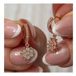 Gümüş Rose Sallantılı Güneş Kadın Küpe