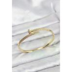 HarmonyAura P217955S7329 Pirinç Gold Renk Zirkon Taşlı Çivi Model Kadın Kelepçe Bileklik