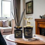 Tiem Concept Yılbaşı Geyik Başlıklı Gold Detaylı 100 ml Oda Kokusu ve Siyah Mum Seti - 1 Adet