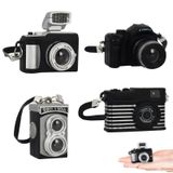 4 adet minyatür kamera 1:4 ölçekli Mini SLR kamera Prop süsleme Vintage kamera modeli Mini dekorasyon aksesuarları fotoğraf sahne