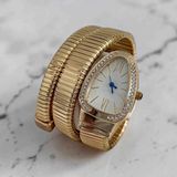 Boutique Kadın Gold Yılan Model Dolamalı Çelik Kol Saati - Taş Detaylı Retro Sarmal Bileklik Saat - Altın