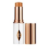 Charlotte Tilbury Unreal Skin Sheer Glow Tint 10 Tan- Nemlendirici Stick Fondöten 8 Ml