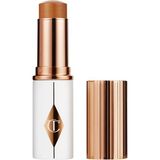 Charlotte Tilbury Unreal Skin Sheer Glow Tint - Nemlendirici Stick Fondöten 11 Tan (8 G)