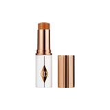 Charlotte Tilbury Unreal Skin Sheer Glow Tint - Nemlendirici Stick Fondöten 12 Tan (8 G)