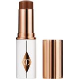 Charlotte Tilbury Unreal Skin Sheer Glow Tint - Nemlendirici Stick Fondöten 15 Deep (8 G)