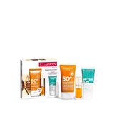 Clarins Nemlendirici Güneş Kremi 50 Ml + Lip Comfort Oil 01 + After Sun Yatıştırıcı Balsam 30 Ml Güneş Kremi Seti