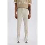 DeFactoFit Esnek Kumaş Sporcu Jogger Eşofman Altı Slim Fit Dar Kesim Dokuma Üç Cepli Fermuarlı Paça B2780AX25SPBG779