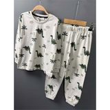 Erkek Çocuk Üzeri Palmiye Ağacı ve Dinazor Baskılı Krem Pijama Takımı - 5 - 6 Yaş