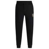 Erkek Regular Fit Beli ve Paçası Lastikli Pamuklu Siyah Spor Eşofman Altı 50534515-001