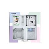 Fujifilm Instax Mini 12 Beyaz Fotoğraf Makinesi + 10'lu Film Simli Pleksi Kılıf Mandal Ve Kıskaçlı Resim Standı