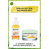 Garnier C Vitamin Serum (Niasinamid + Salisilik Asit) + C Vitamin Nemlendirici Krem & Makyaj Çantası Hediye