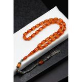 Kalem Oyma İşçilikli Gümüş Püsküllü Turuncu Sıkma Tesbih 6 X 11 Mm Beyzi Kesim