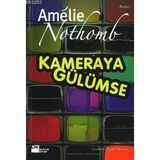 KAMERAYA GÜLÜMSE - AMÉLIE NOTHOMB