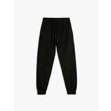 KOTON Erkek Çocuk Normal Bel Cep Detaylı Normal Paça Paçası Lastikli Jogger Pantolon, Siyah (999), 11/12 Yaş