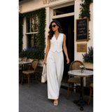 LADYA COLLECTION Beyaz Yelek ve Yüksek Bel Geniş Paça Pantolon Eden Takım