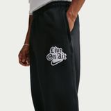 NIKE Solo Swoosh Fleece Cuffed Pant Erkek Siyah Eşofman Altı IQ5560-010