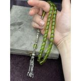 Onurlu Tesbihane Alpaka Nakkaş İmameli Fıstık Yeşili Ateş Kehribar Tesbih (9x10 mm) OT-ATS-KHRBR-036