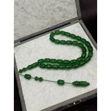 Onurlu Tesbihane Sistemli Yeşil Ateş Kehribar Tesbih (8x12 mm) OT-ATS-KHRBR-047