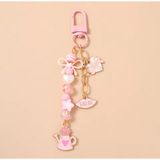 Pembe Boncuklu Anahtarlık, Yay ve Sulama Kabı Charm | Kiss Me Charm, Kalp Detaylı, Altın Zincir, Yıldız Boncuk, Çanta Aksesuarı
