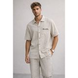 Polo State Erkek Oversize Kısa Kollu Dokulu Baskılı Bej Gömlek – More Than Words