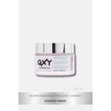 Qxy Essence Bright Guard Cream - 50 SPF Uva/Uvb Filtreli Pembe Hızlı Emilen Nemlendirici Gündüz Kremi - Centella Asiatica + Peptit Complex - Cam Kavanoz 50 ml