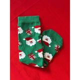 Sfenks. Yılbaşı Temalı Noel Baba Desenli Yeşil Çorap – Unisex, Yumuşak ve Esnek