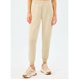 Skechers S2610002-1550 W Essentials Jogger S Krem Regular Fit Kadın Eşofman Altı