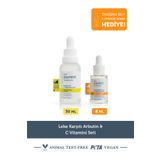 The Purest Solutions Leke Karşıtı Arbutin & C Vitamini Seti: 30 ml Leke Serumu + 8 ml Tanışma Boy C Vitamini