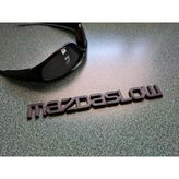 Mazdaslow Amblem
