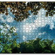 Cakapuzzle Sarı ve Yeşil Yapraklar Arasından Gökyüzü Mdf 120 Parça Puzzle