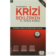 EKONOMIK KRIZI BEKLERKEN - HAKAN ÖZEROL