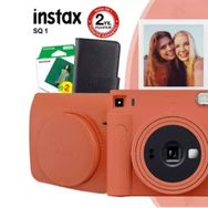 Instax SQ1 Fotoğraf Makinesi + Çanta + Albüm +Turuncu 20'li Film Seti