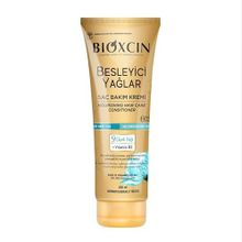 Bioxcin 250 ml Besleyici Yağlar Kuru ve Yıpranmış Saçlar Saç Dökülme Karşıtı Saç Bakım Kremi
