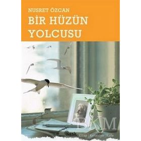 BIR HÜZÜN YOLCUSU - NUSRET ÖZCAN