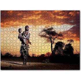 Cakapuzzle Günbatımında Bulutlar ve Çocuğuyla Bir Afrika Kadını 1000 Parça Puzzle