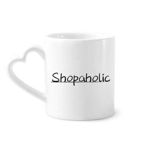 Dıythinker 350 ml Şık Kelime Shopaholic Seramik Kalp Saplı Kupa