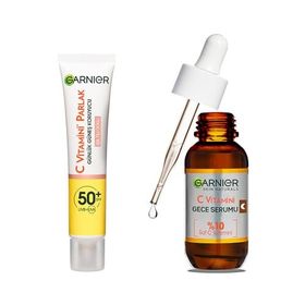 Garnier 40 ml C Vitamini Parlak Günlük Uv Korumalı Güneş Yüz Kremi Spf50 Işıltılı Doku & 30 ml C Vitamini Süper Aydınlatıcı Gece Serumu Cilt Bakım Seti