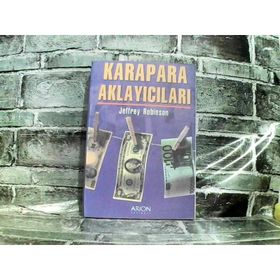 KARAPARA AKLAYICILARI - JOHN ROBINSON