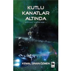 Kutlu Kanatlar Altında / Döngü Üçlemesi 2. Kitap / Kemal Sinan Özmen