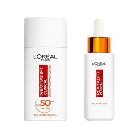L'Oréal Paris Revitalift Clinical 12 Saf C Vitamini Aydınlatıcı Serum Revitalift Clinical SPF 50+ Günlük Yüksek Uv Korumalı Yüz Güneş Kremi 50 ml Çanta Cilt Bakım Seti