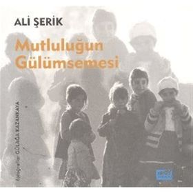 MUTLULUĞUN GÜLÜMSEMESI - ALI ŞERIK