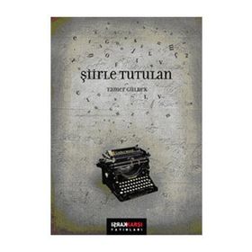 ŞİİRLE TUTULAN - TAMER GÜLBEK