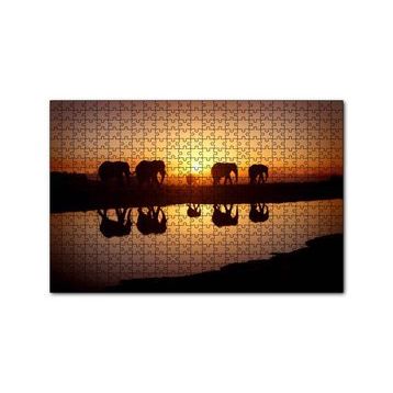 Cakapuzzle Günbatımında Nehir Kenarındaki Fil Ailesi 120 Parça Ahşap Puzzle