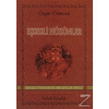 EŞSESLİ HÜZÜNLER - ÖZGÜR ÖZMERAL